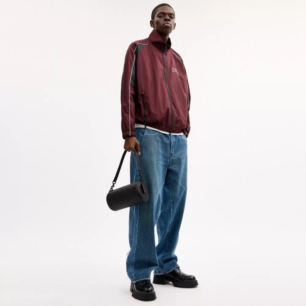 Andre Barrel Bag 24 i Signature Canvas