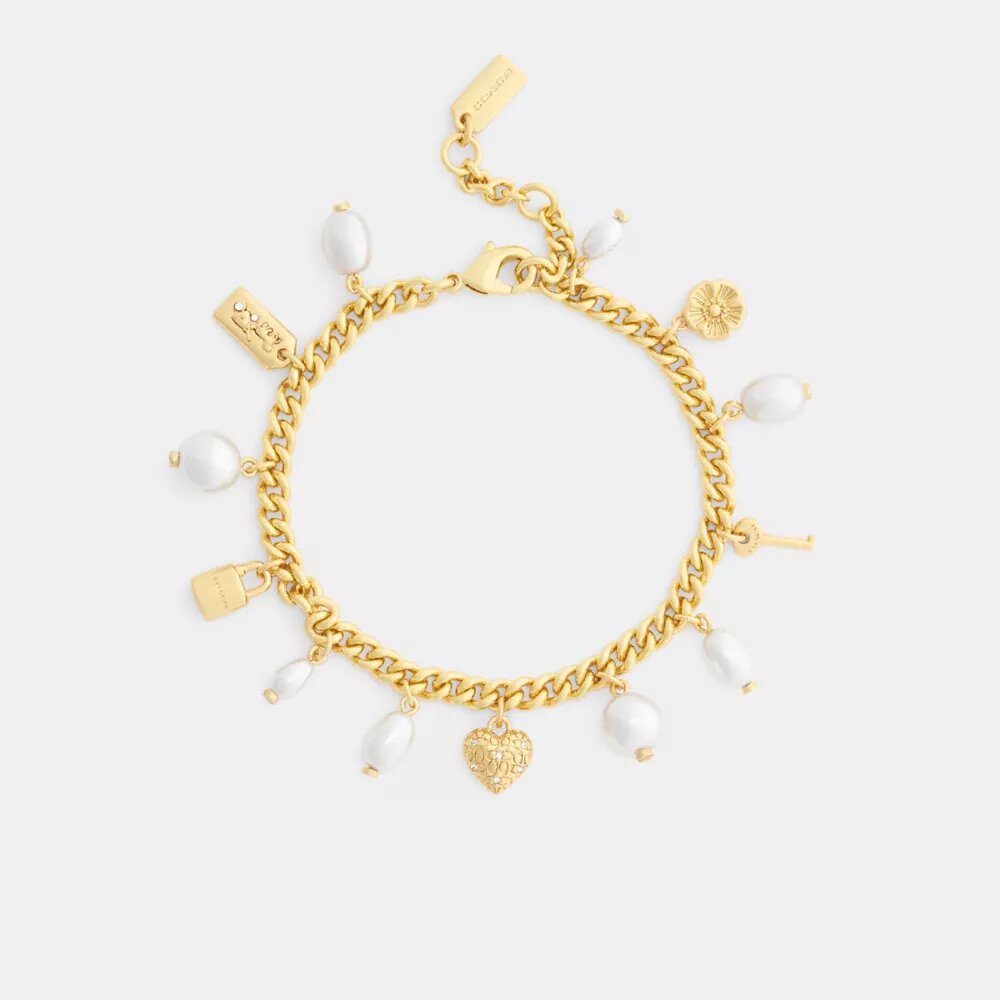 Armband med pärlor och hjärt-smycken
