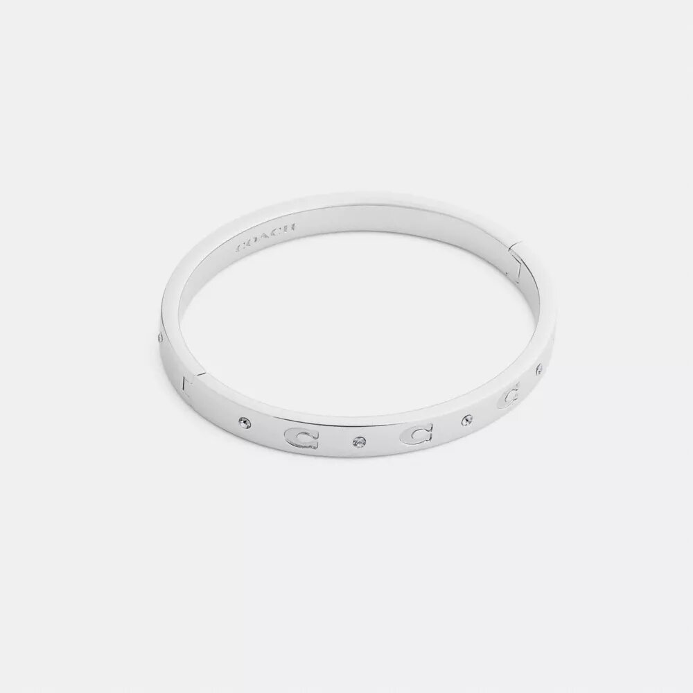 Armband med upprepade C-mönster och gångjärn