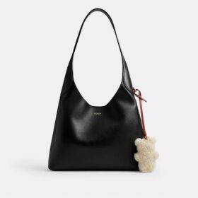 Björnformade väsksmycken i shearling