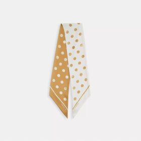 Bred, smal silkescarf med slitet prickmönster