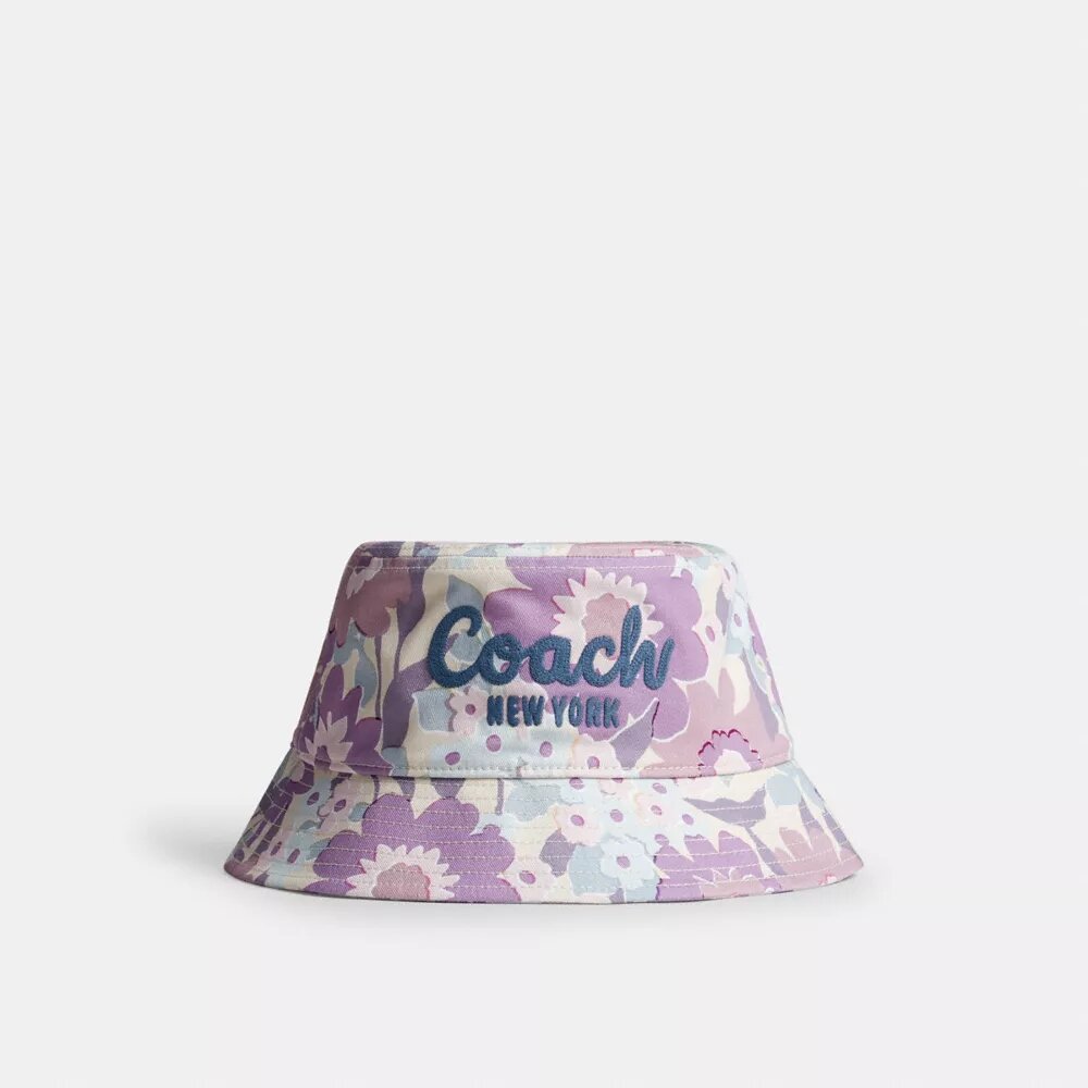 Bucket-hatt med Coach-skrift och blommönster