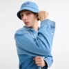 Buckethat i denim med broderad Coach-logotyp