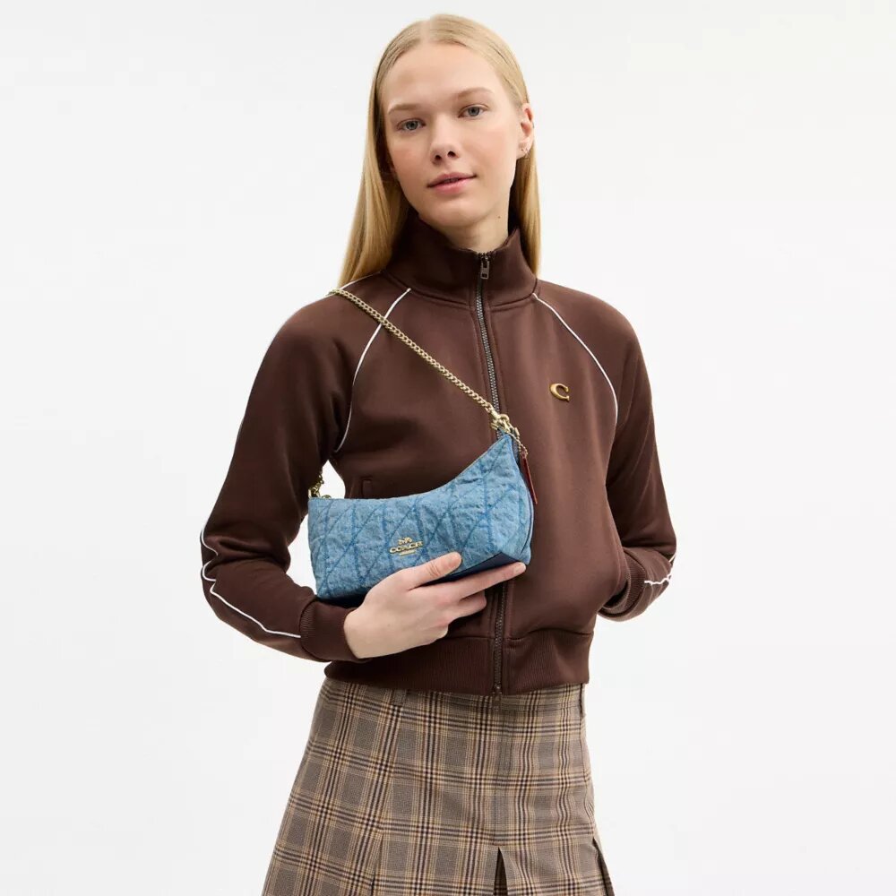 Caitlin-axelremsväskor med quiltning