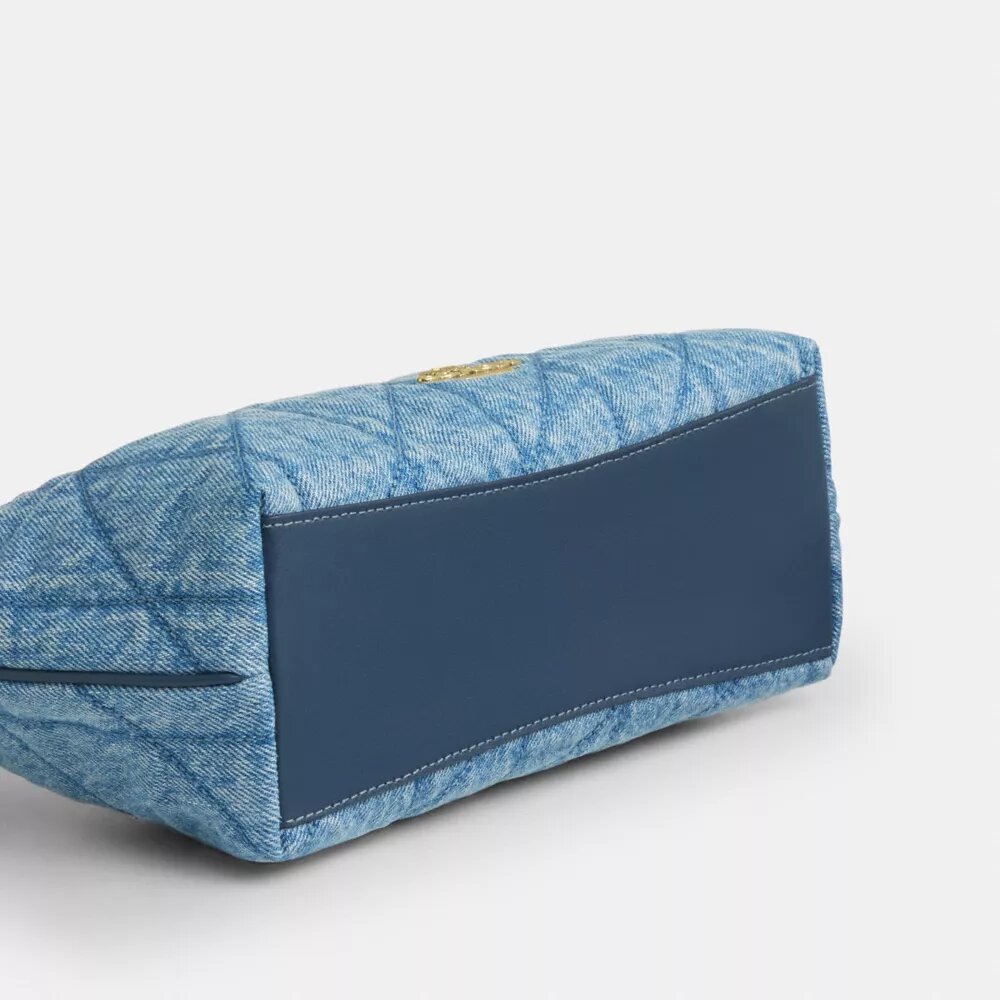 Caitlin-axelremsväskor med quiltning