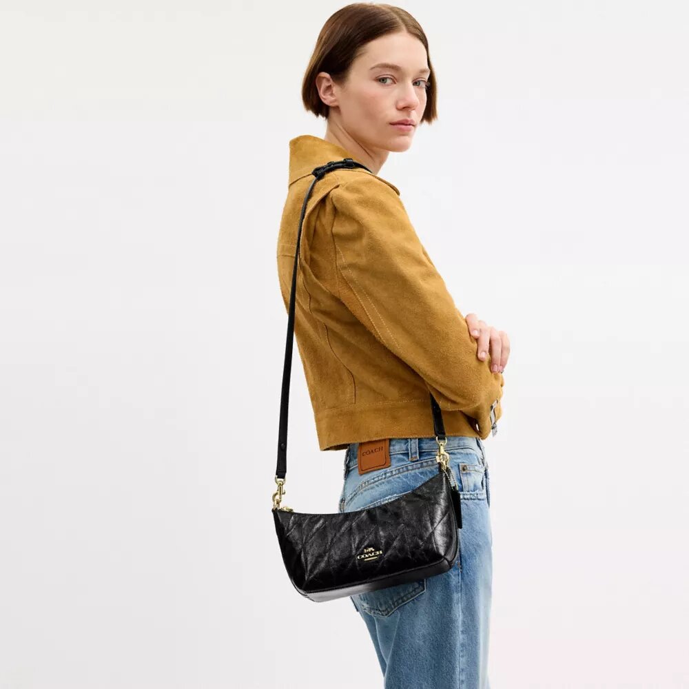 Caitlin-axelremsväskor med quiltning