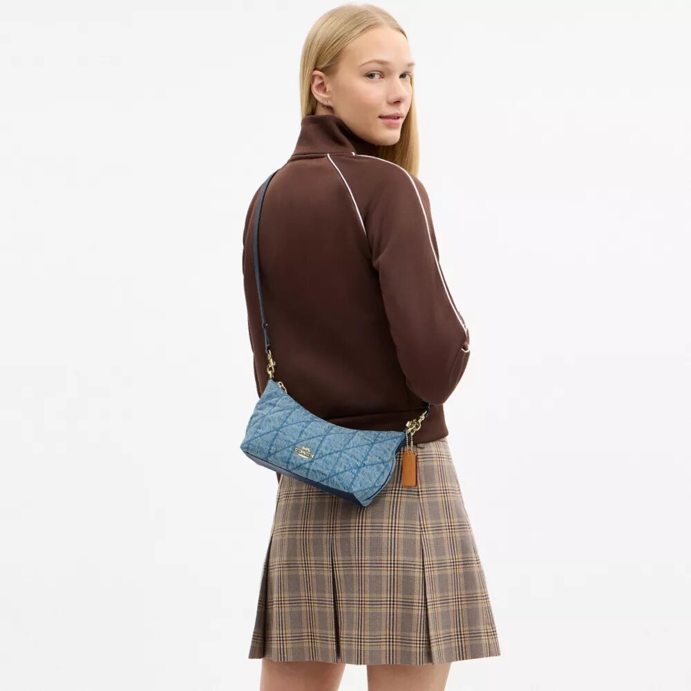 Caitlin-axelremsväskor med quiltning