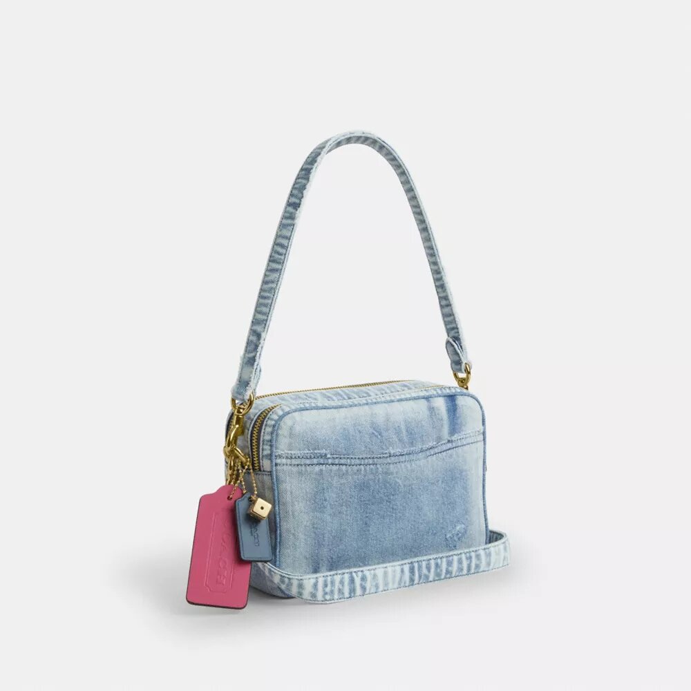 Carey-axelremsväska i Loved Denim med smycken