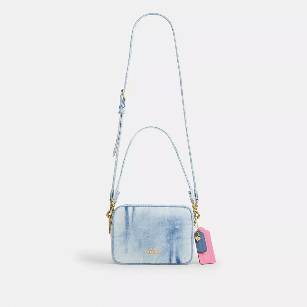 Carey-axelremsväska i Loved Denim med smycken