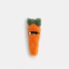 Carroty-skor-smycken i shearling