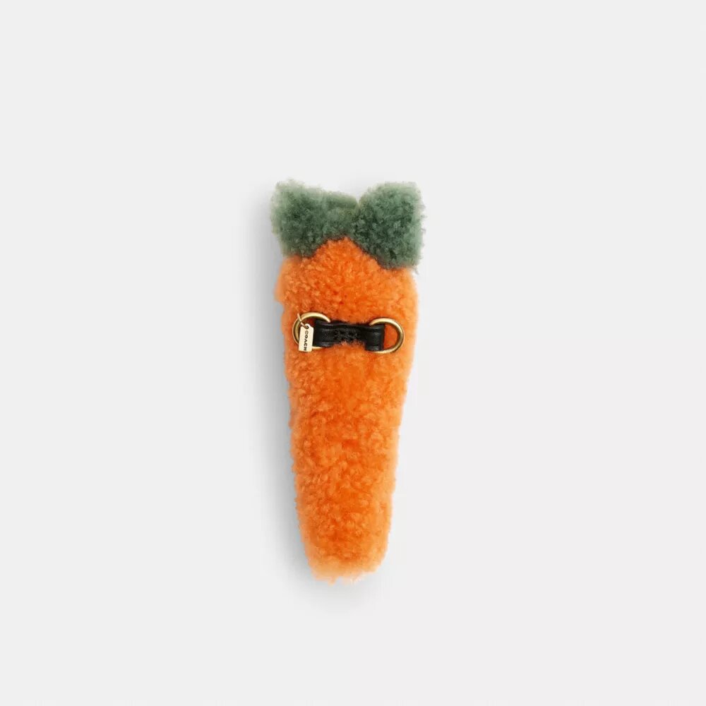 Carroty-skor-smycken i shearling