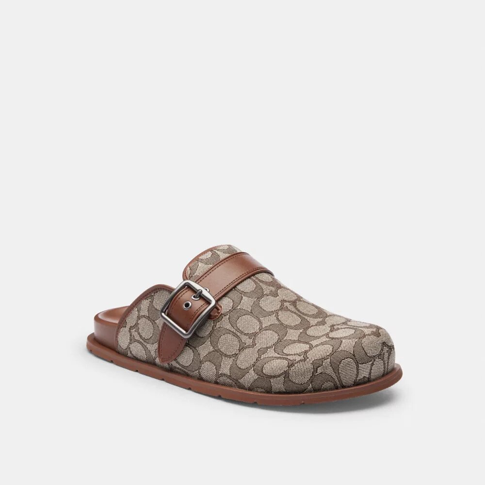 Clogs med spänne i vår signaturjacquard