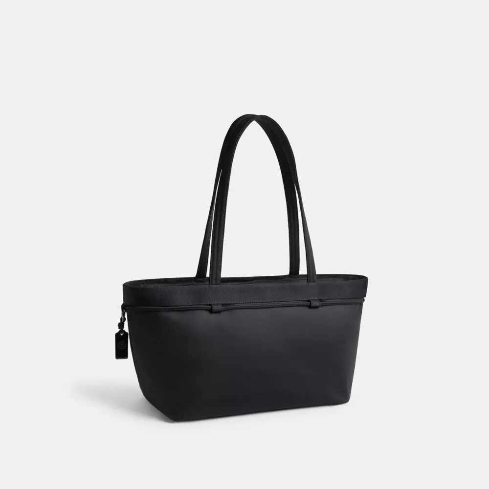 Coachtopia Loop Bow-tygkassar