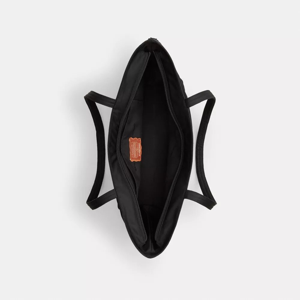 Coachtopia Loop Bow-tygkassar