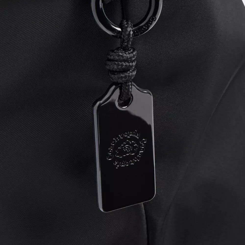 Coachtopia Loop Bow-tygkassar