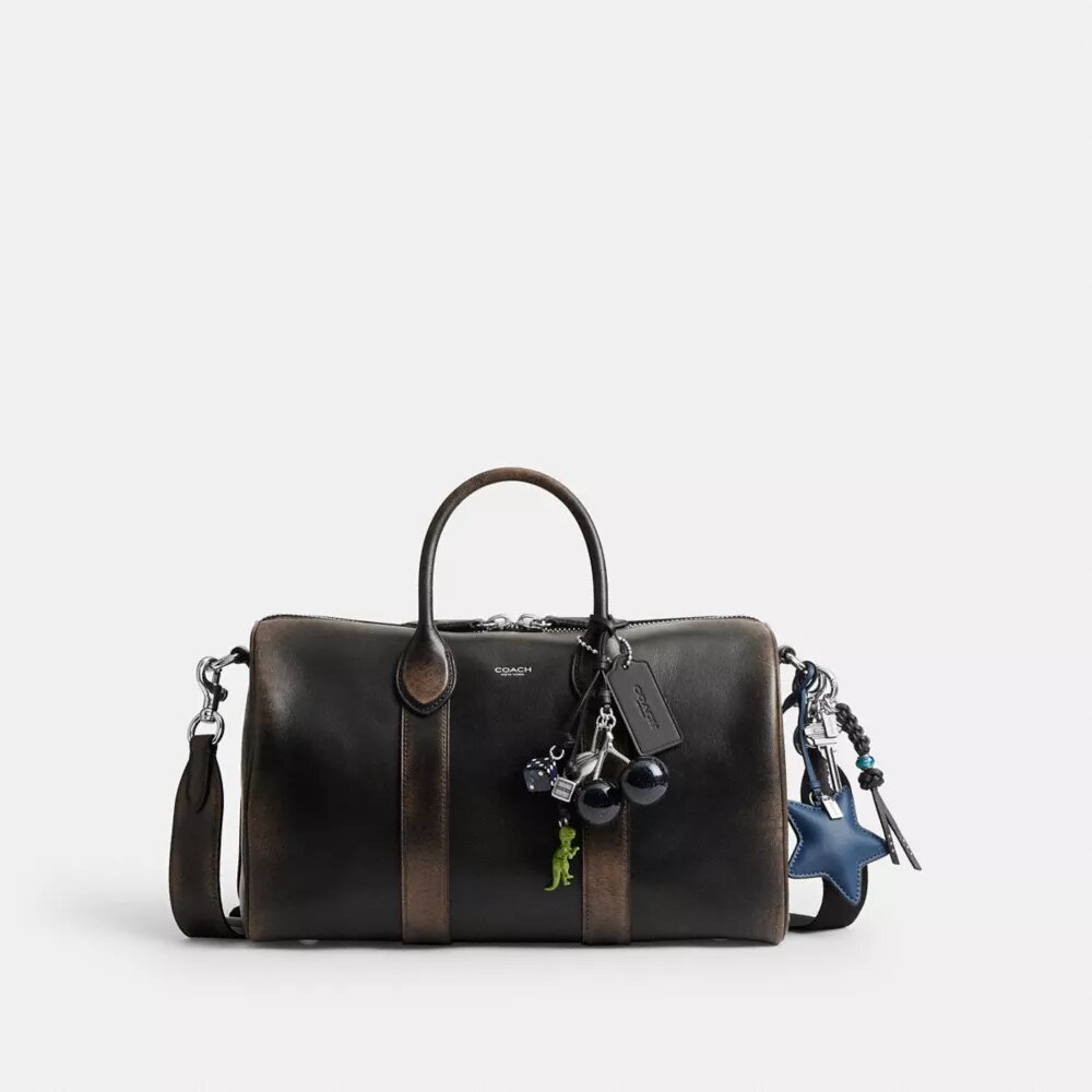 Compass Bag 35 i slitet läder med smycken