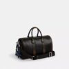 Compass Bag 35 i slitet läder med smycken