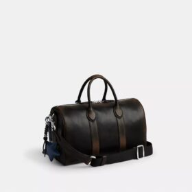 Compass Bag 35 i slitet läder med smycken