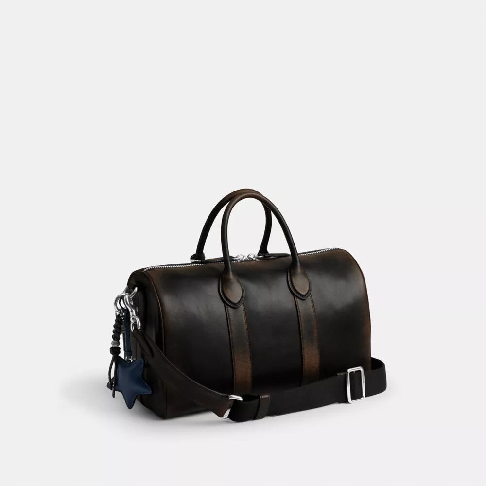 Compass Bag 35 i slitet läder med smycken