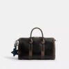 Compass Bag 35 i slitet läder med smycken