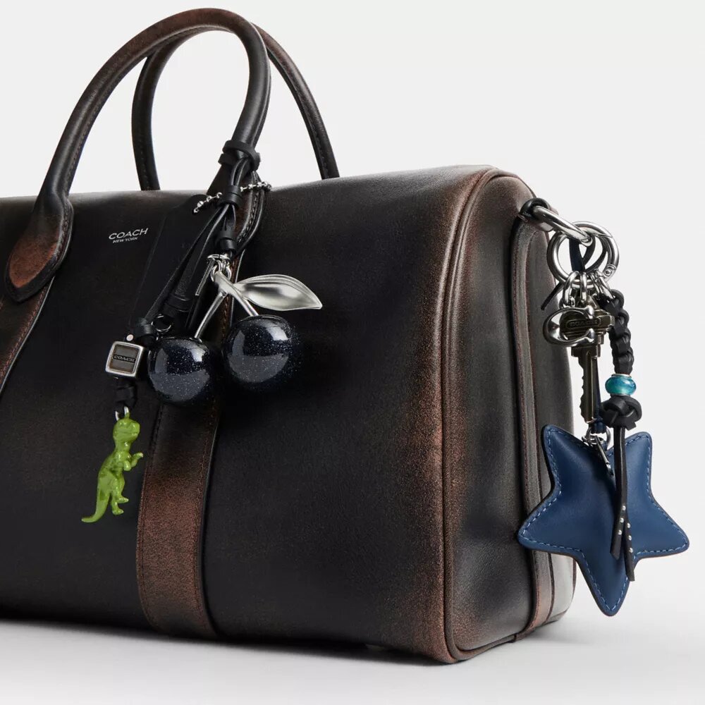 Compass Bag 35 i slitet läder med smycken