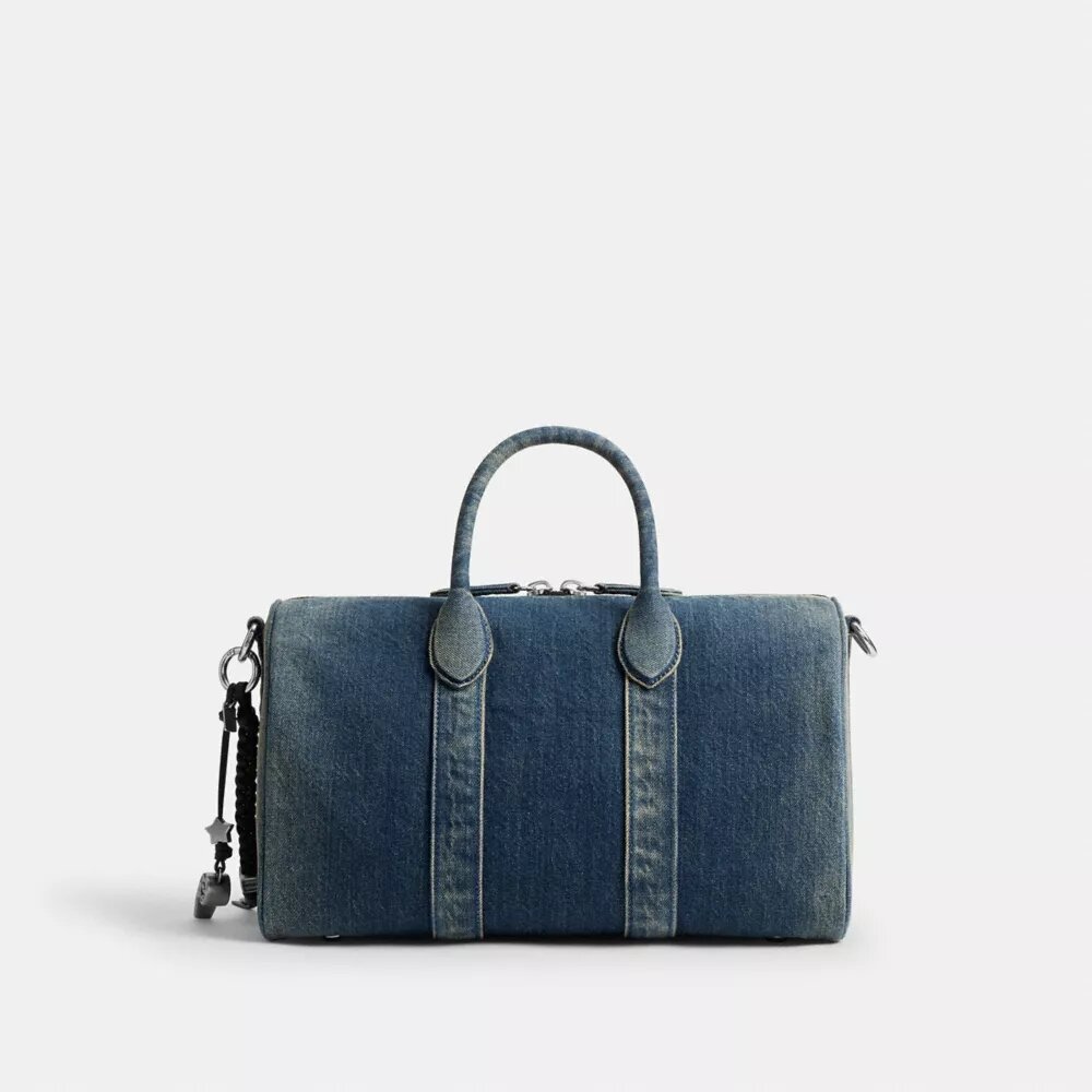 Compass-väska 35 i regenerativ bomullsdenim med smycken