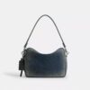 Dakota-axelremsväskor i regenerativ bomullsdenim med smycken