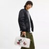 Disney X Coach Compass Bag 35 med Musse Pigg