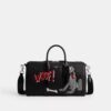 Disney X Coach Compass Bag 35 med Pluto