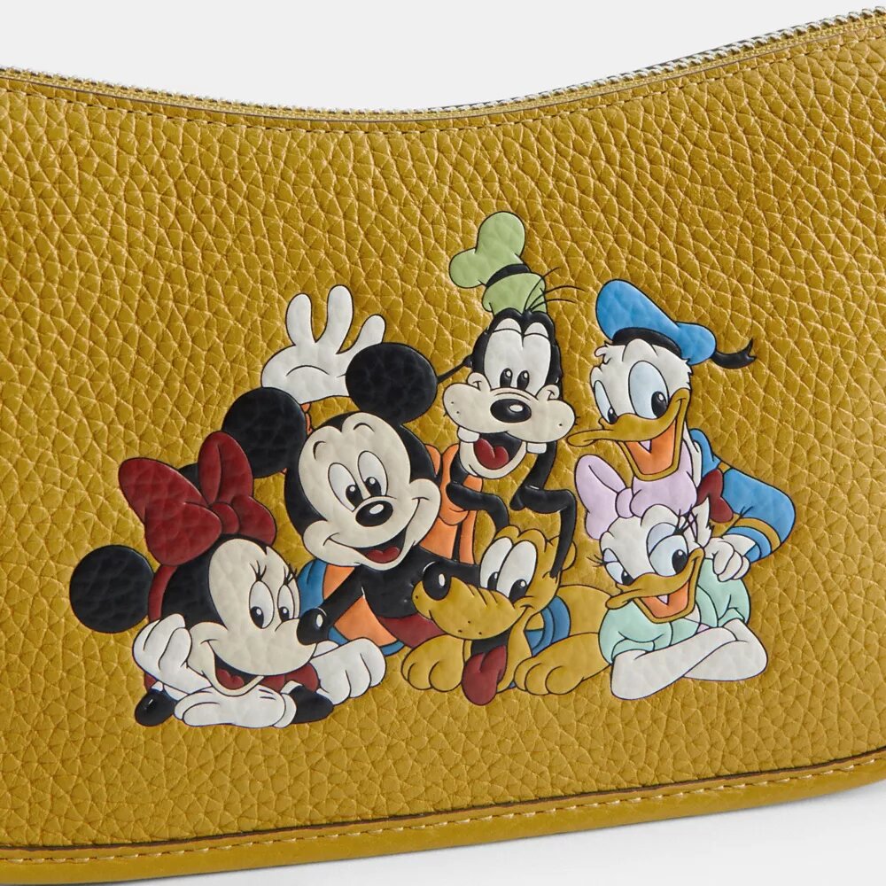 Disney X Coach Swinger-väskor i regenererat läder med Musse Pigg och vännerna
