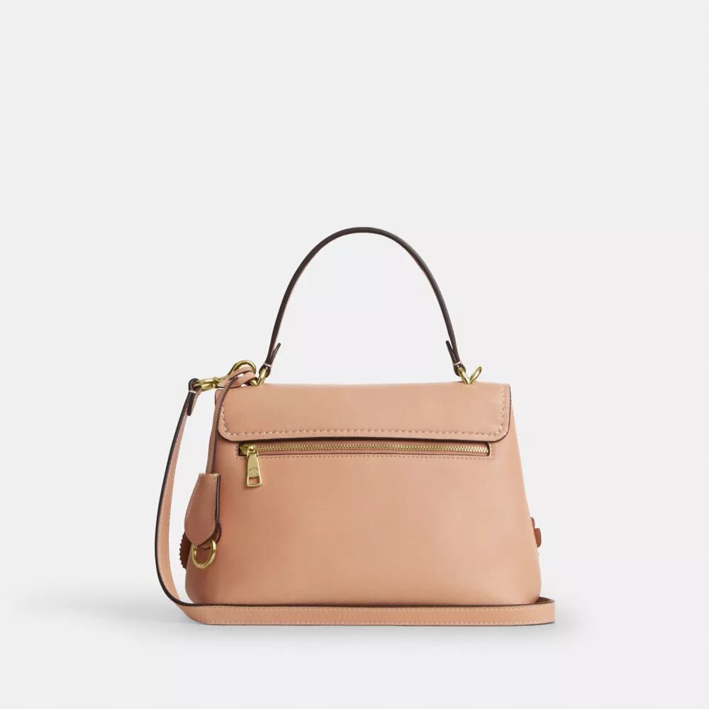 Emory-väska med handtag och blommig applikation