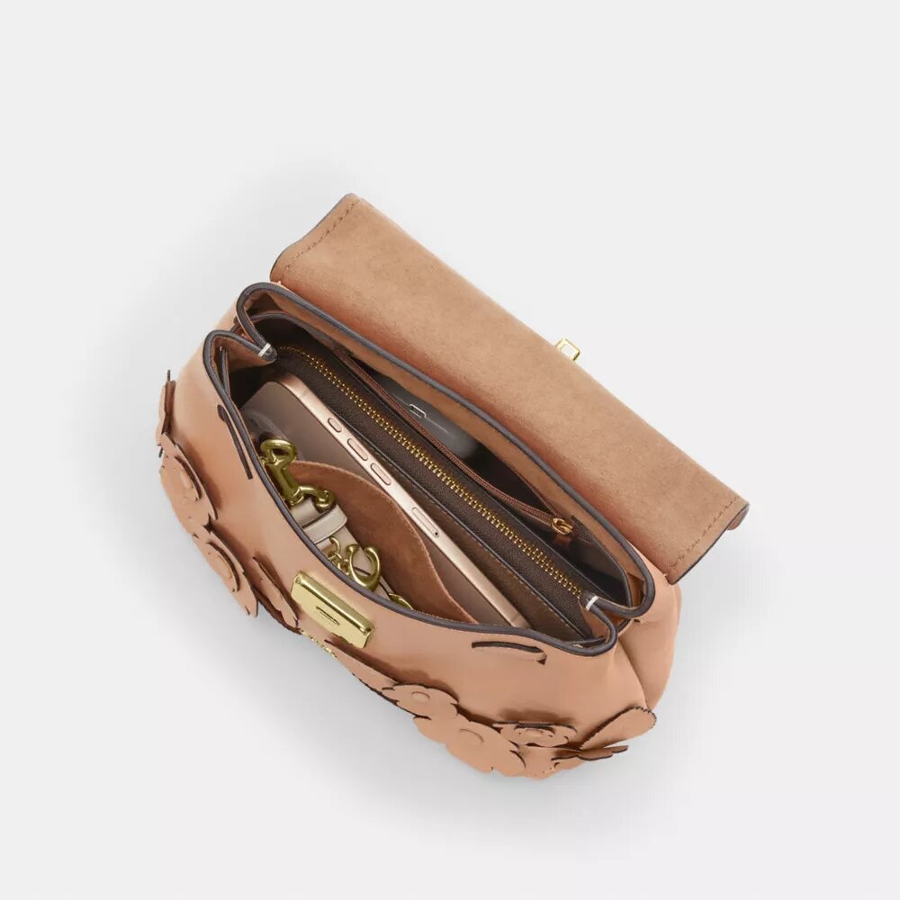 Emory-väska med handtag och blommig applikation