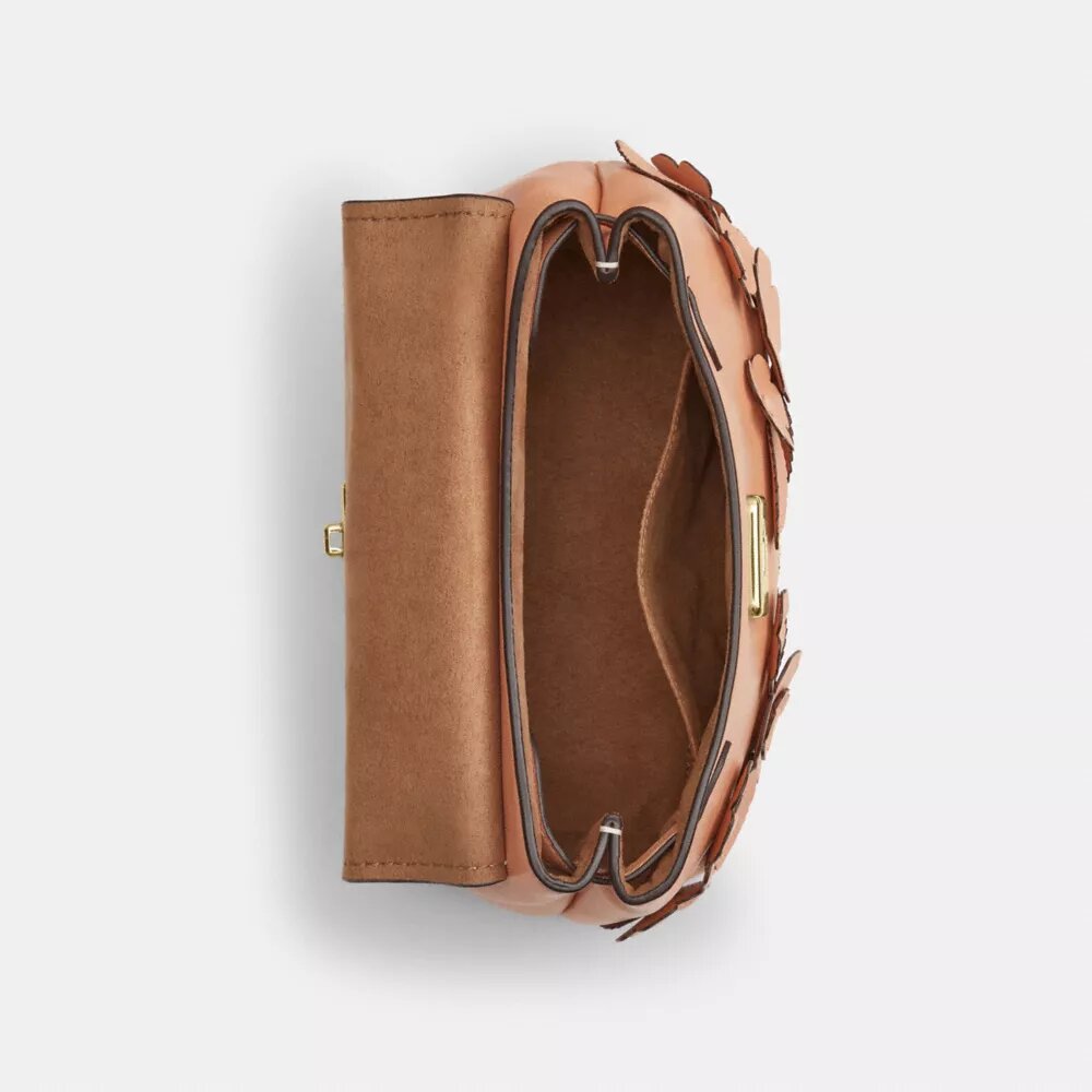 Emory-väska med handtag och blommig applikation