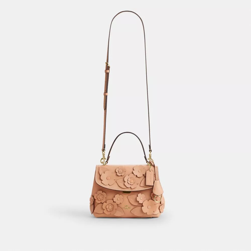 Emory-väska med handtag och blommig applikation