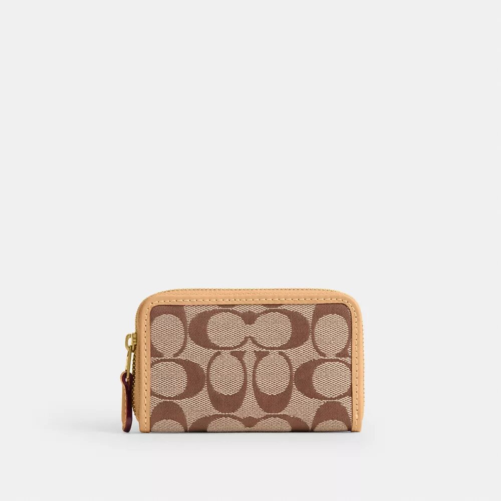 Essential – liten kortplånbok med dragkedja runt om i vår signaturjacquard