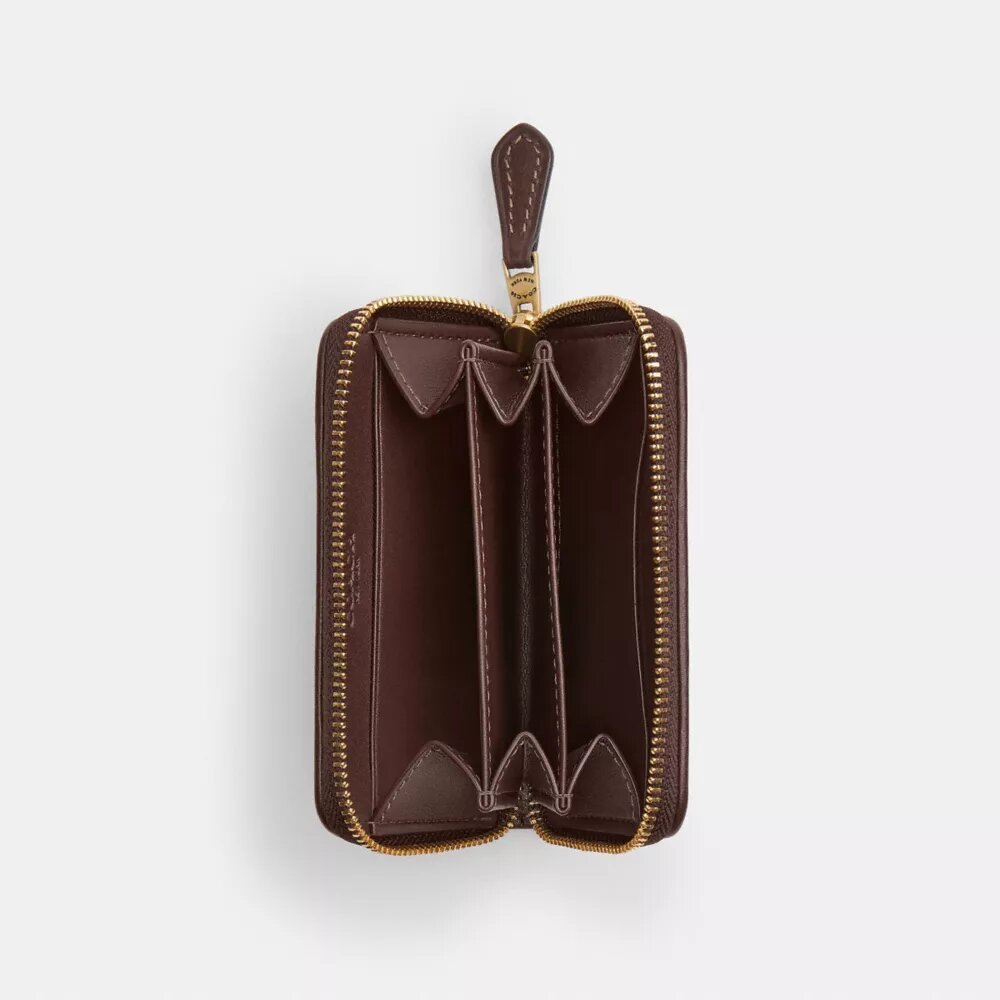 Essential – liten kortplånbok med dragkedja runt om i vår signaturjacquard