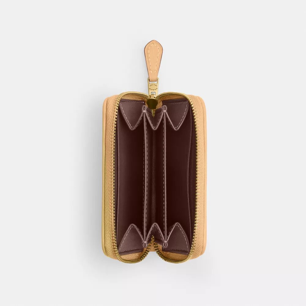 Essential – liten kortplånbok med dragkedja runt om i vår signaturjacquard