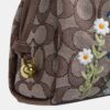 Faye-axelremsväskor i signaturjacquard med blommig broderi