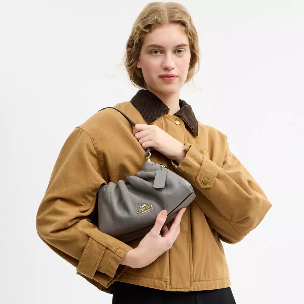 Faye axelremsväskor med quiltning