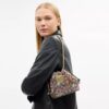 Faye Mini-dragpåse i signaturjacquard med blommig broderi
