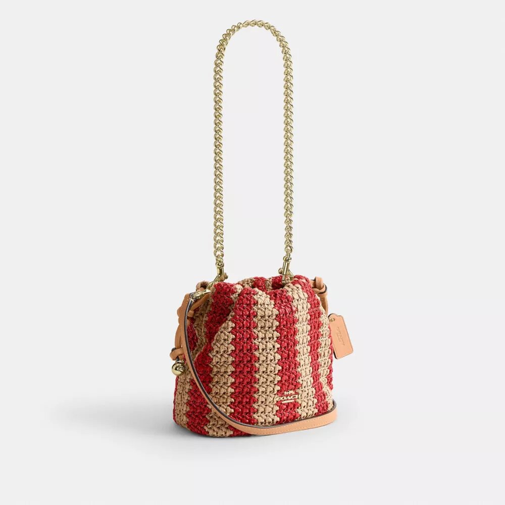 Faye Mini-dragpåse med ränder