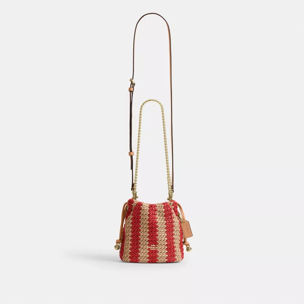 Faye Mini-dragpåse med ränder