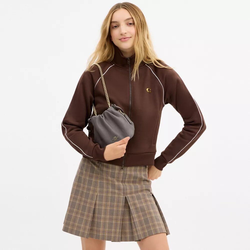 Faye Mini-väska med dragsko och quiltmönster