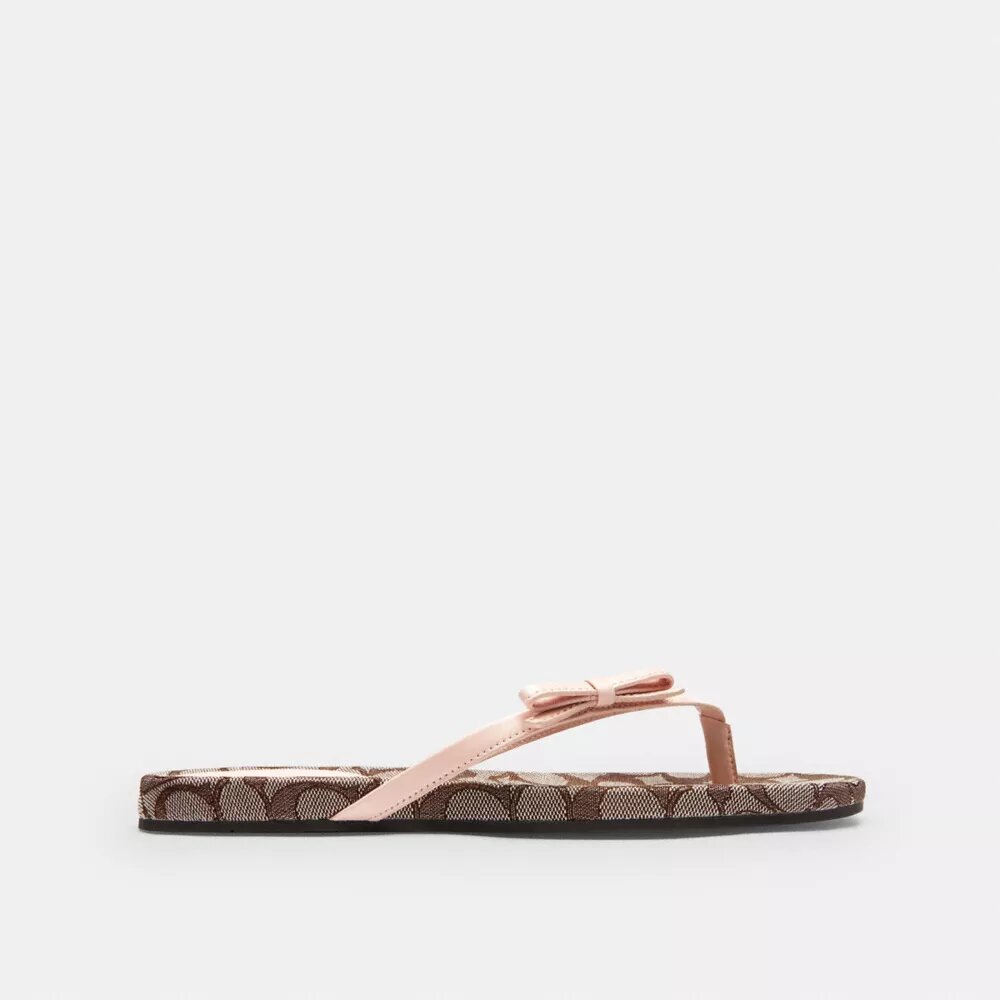 Flip-flops med rosett i Signature Jacquard