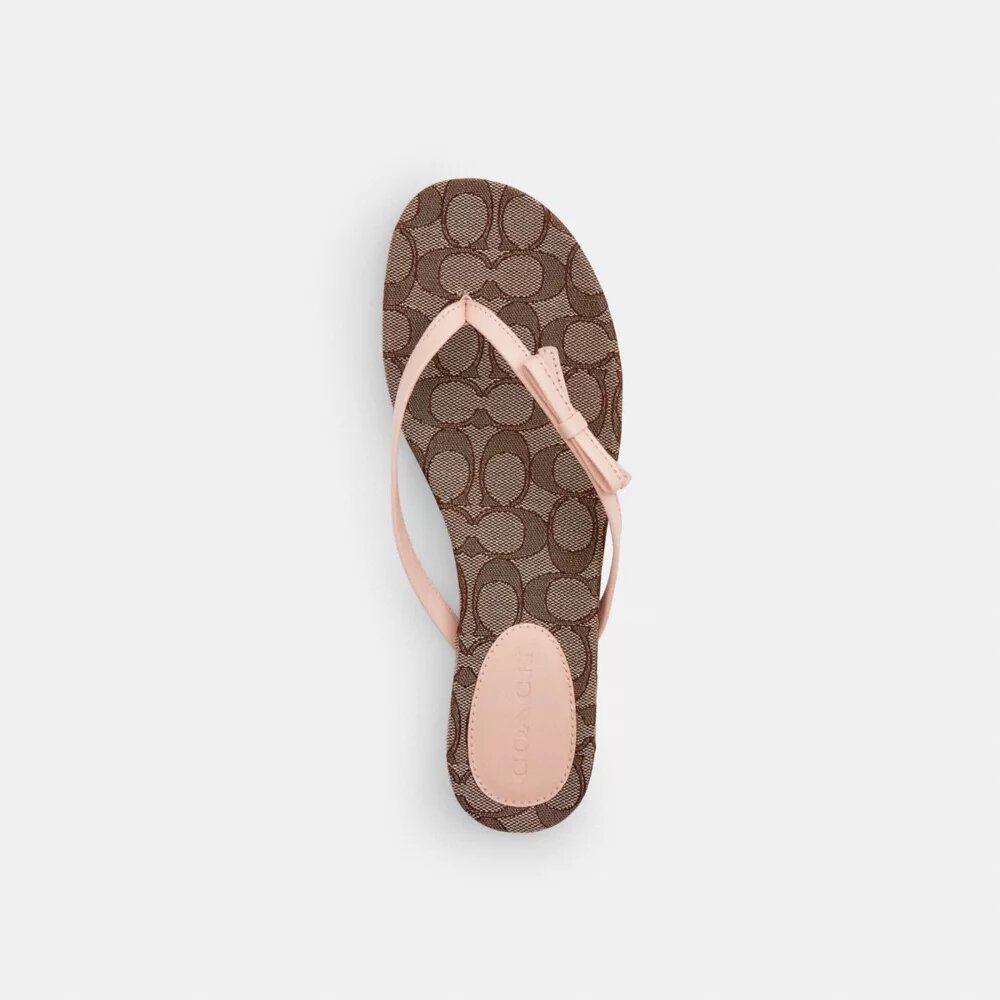 Flip-flops med rosett i Signature Jacquard