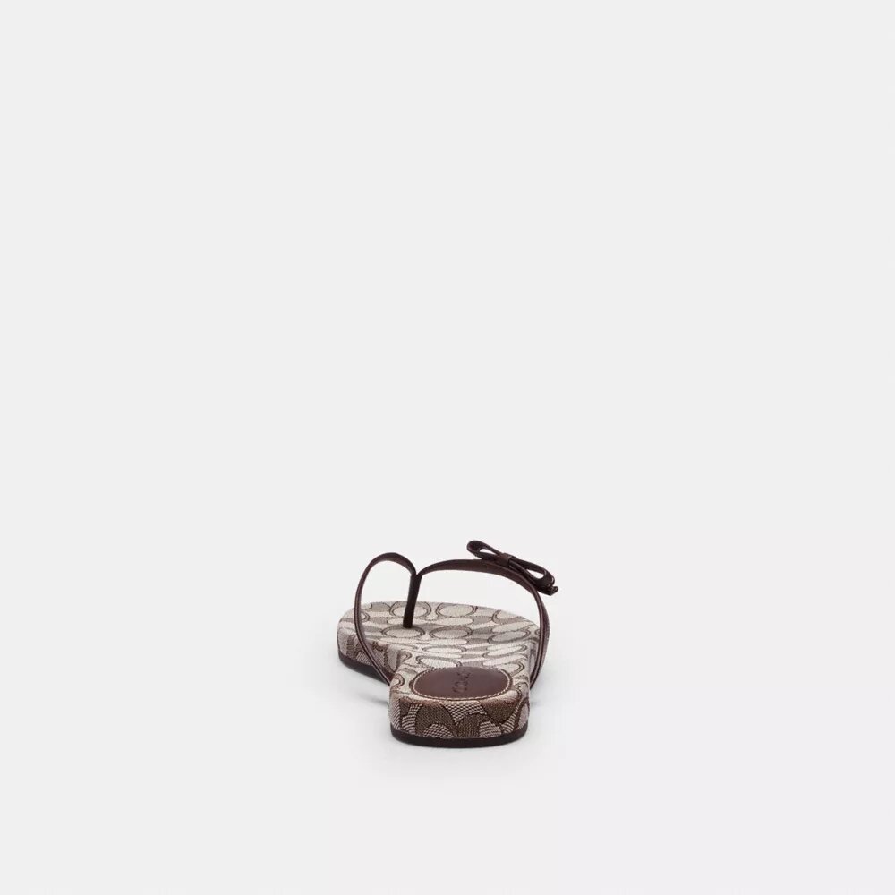Flip-flops med rosett i Signature Jacquard