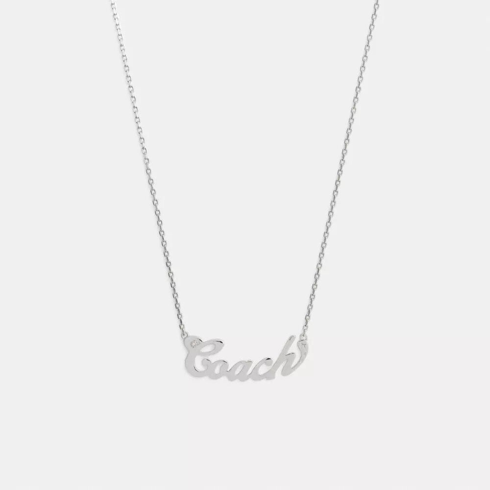 Halsband med namnskylt i Coach Script