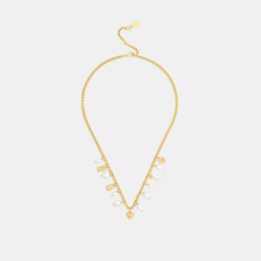 Halsband med pärl- och hjärt-smycken
