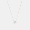 Halsband med upprepade C-formade rondeller