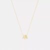 Halsband med upprepade C-formade rondeller